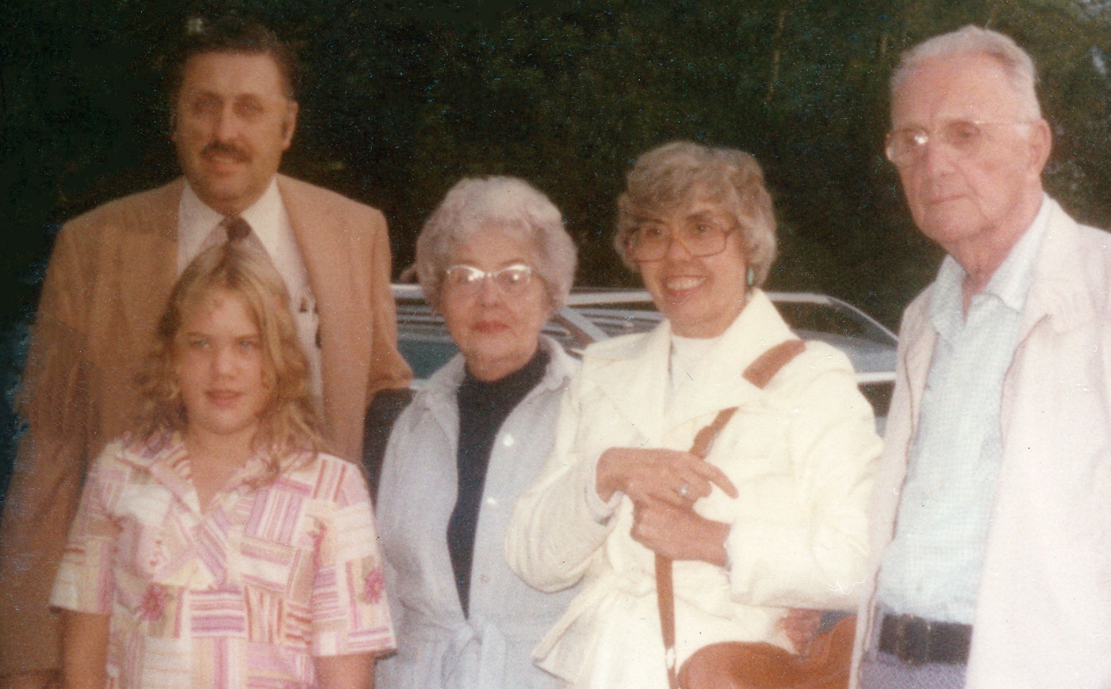 With my parents and my Dad's parents in 1977 while we were out in Ohio visiting my grandparents. My parents were divorced by this time, but my mother worked hard to maintain a relationship with my grandparents. Although my girls never knew my grandparents, our house was filled with photos of them and the family bond was created. 